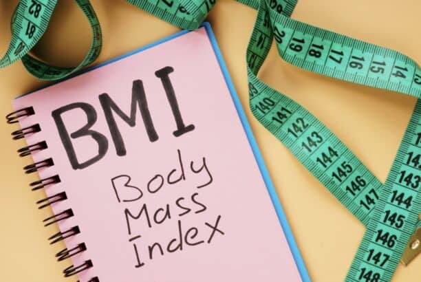 A notebook promoting healthy BMI with the words "body mass index" on it.